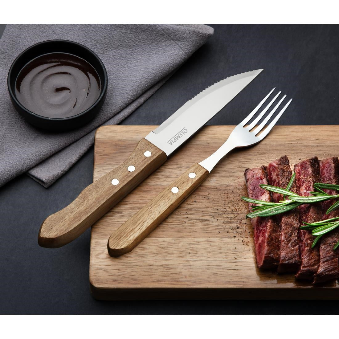 Olympia Jumbo Steak Knife Rosewood 255mm (12 Pack) (255(L)mm. Serrated Blade. Pack Quantity: 12. Material: 18/0 Stainless Steel and Acacia wood) • PAS-GG819