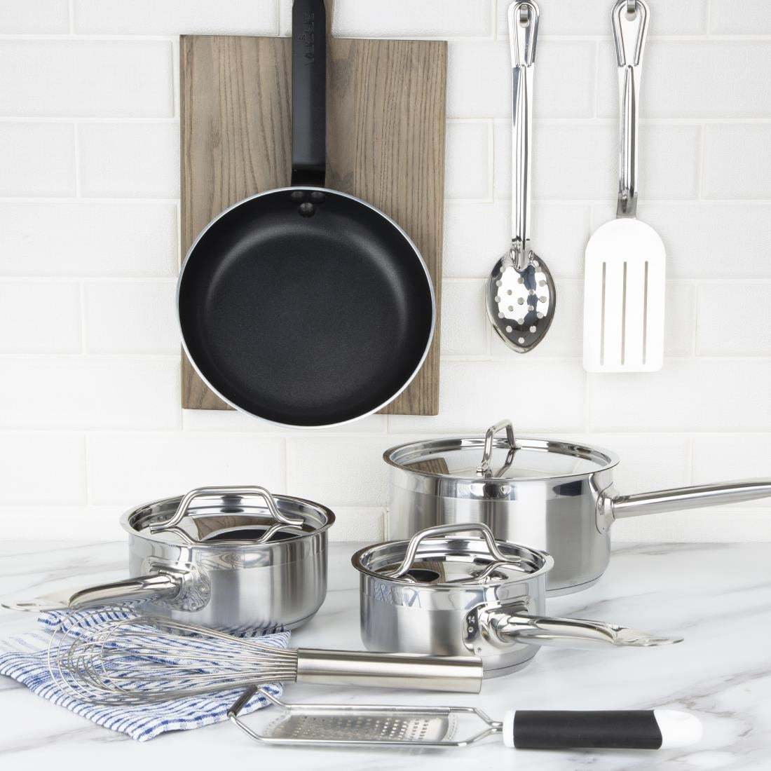 Nisbets Essentials Cook Like A Pro Stainless Steel & Aluminium 4-Piece Saucepan and Frying Pan Set (Pack of 4) • PAS-SA689